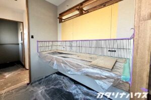 松山市内のマンションリノベ。タイル張りの造作洗面