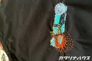 表から当て布をして補修したカラフルなダーニング